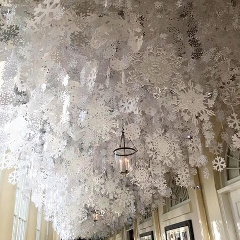 Making paper snowflakes will be a good family tradition