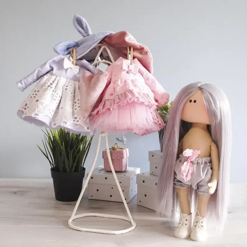 What materials are needed for a textile doll?