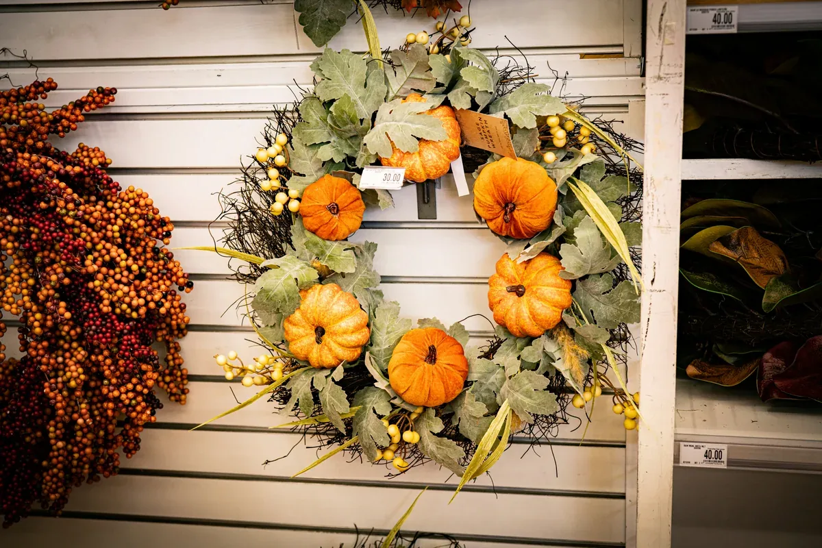 Fall harvest wreath with pumpkins and warm autumn colors