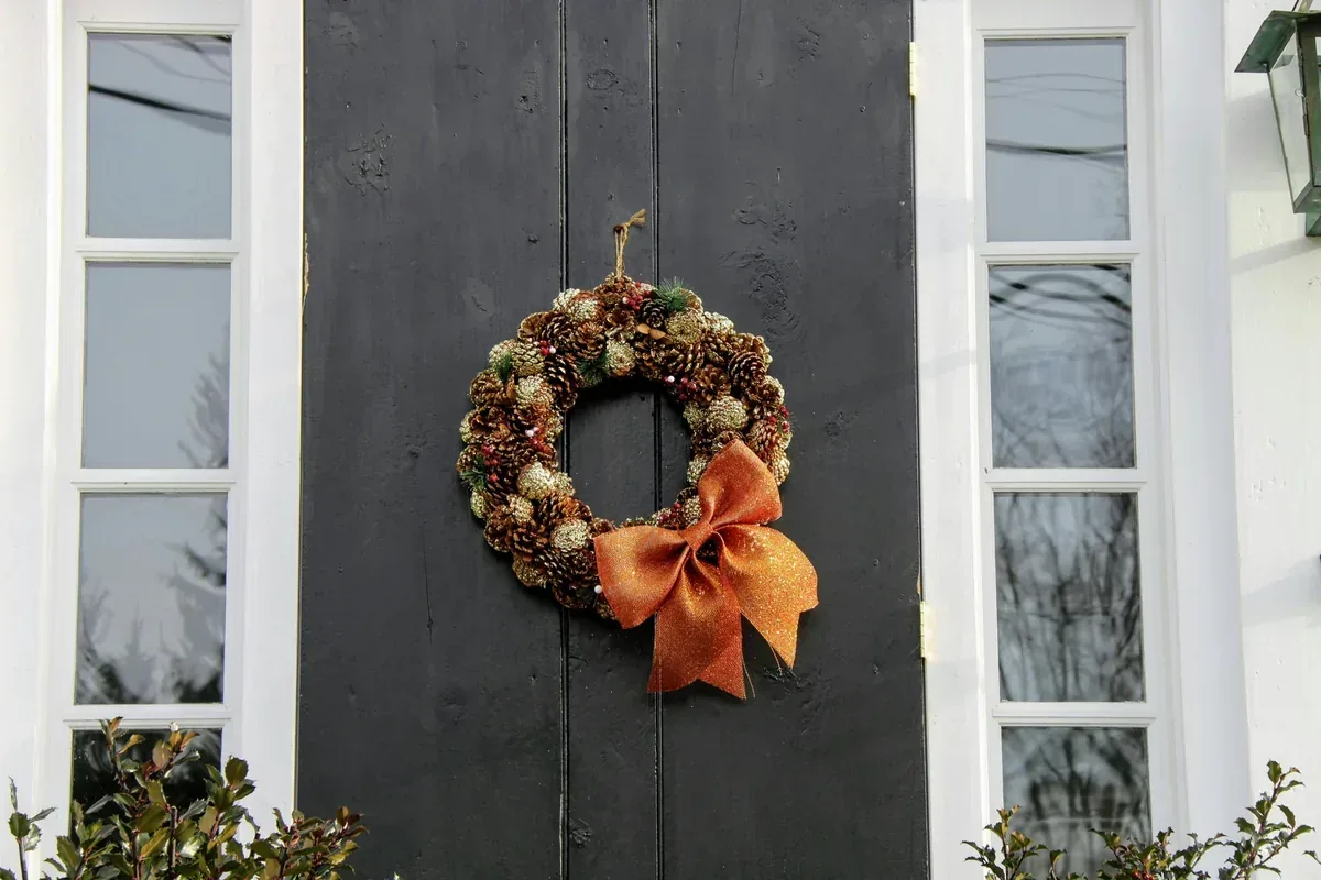 A wreath hanging on a door (fall decor inspiration)