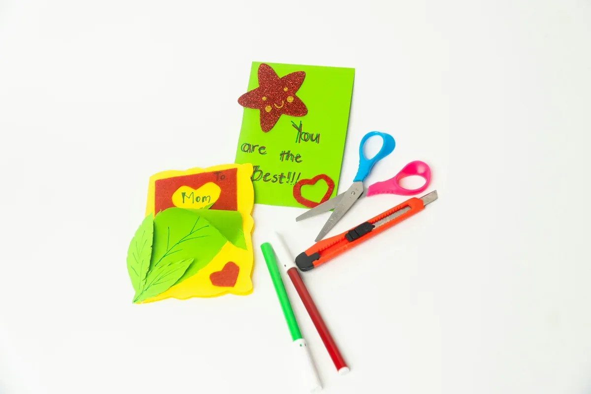 Close-up of layered paper shapes on a greeting card