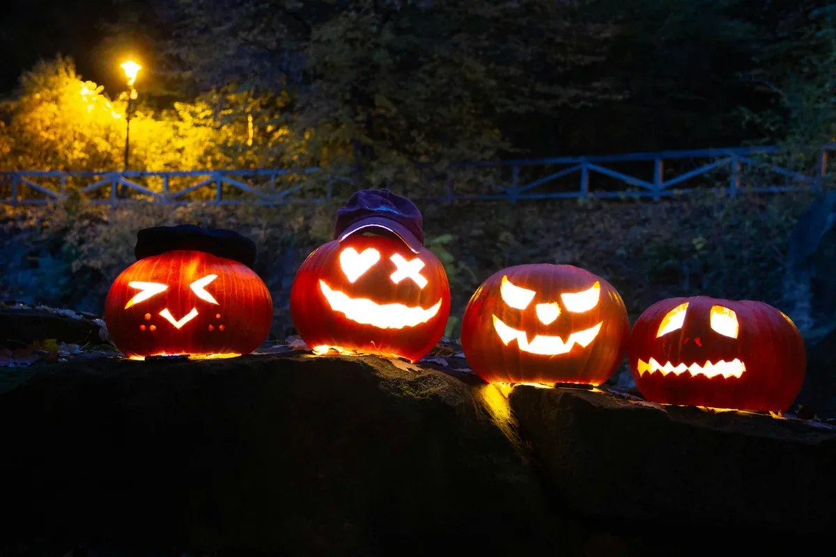Paper pumpkin lantern pieces and cutouts ready to assemble