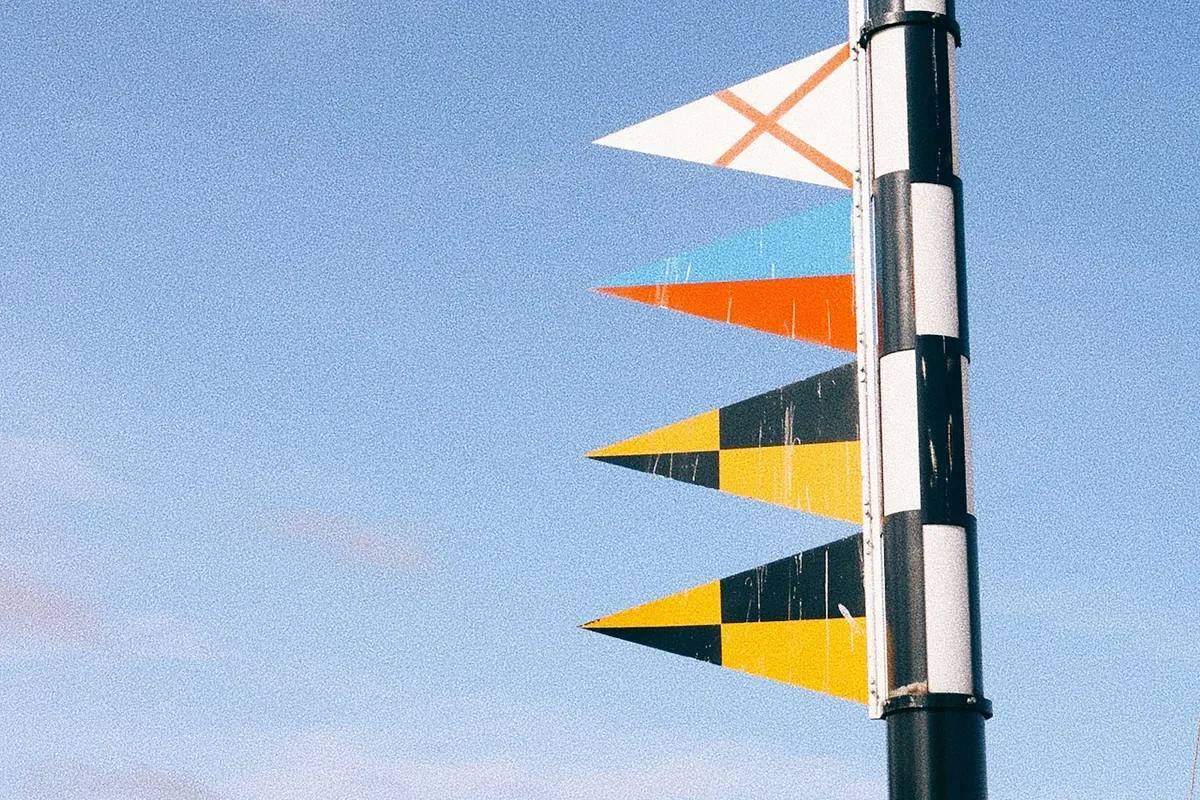 Paper pennants with bold letters and school colors