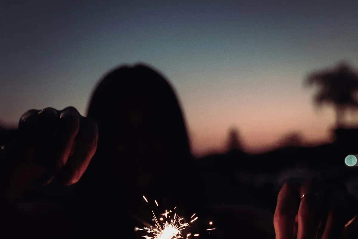 Patriotic paper fireworks wall decor with confetti-style accents